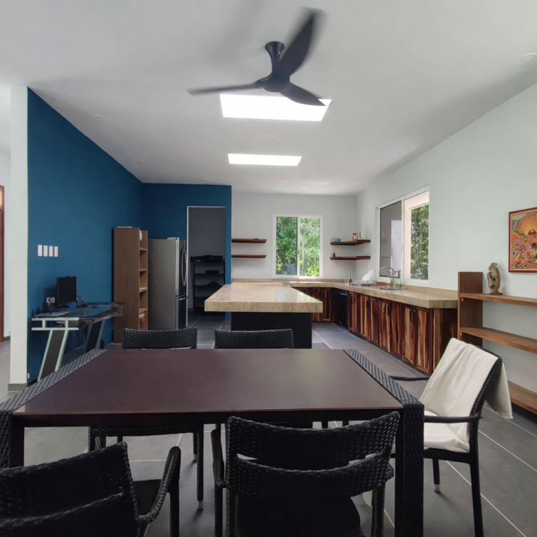 Hacienda Richardson for sale in Los Árboles Tulum, listed by Play-Investments.com. Sustainable mid-century home on 5 acres with solar system, guest house and potable water. USD 420,000.