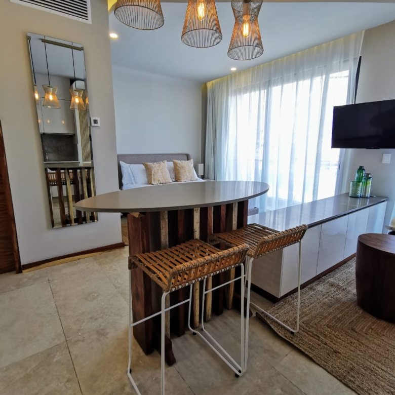 Descubre Alizée Tower, departamentos tipo condohotel en venta en Playa del Carmen, ideales para inversión y renta vacacional en la Riviera Maya.